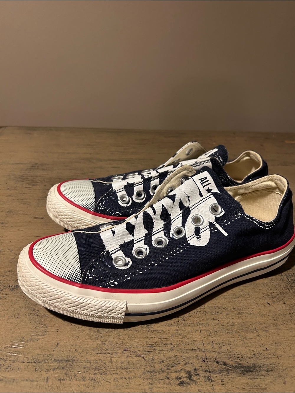 Converse Navy and White Low Top Sneakers with Red Trim